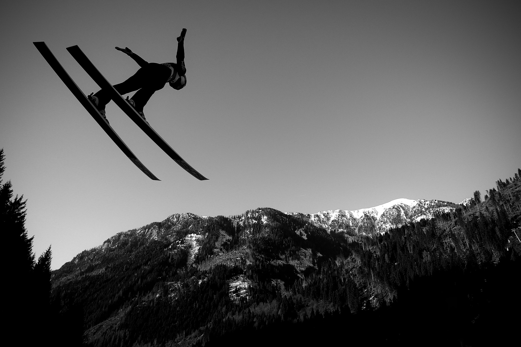 An athlete in action during the ski jumping portion of the Individual Gundersen competition of the FIS Nordic Combined World Cup in Predazzo, Italy, 11 January 2020. PhotoSolero/ANDREA SOLERO